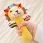 Hochet tissus lion
